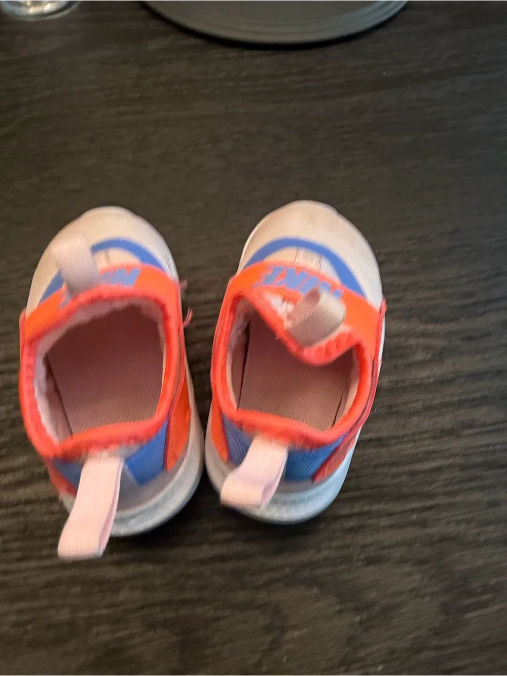 Nike Kids Slip-On Sneakers in Pink with Orange Strap and Blue Accent